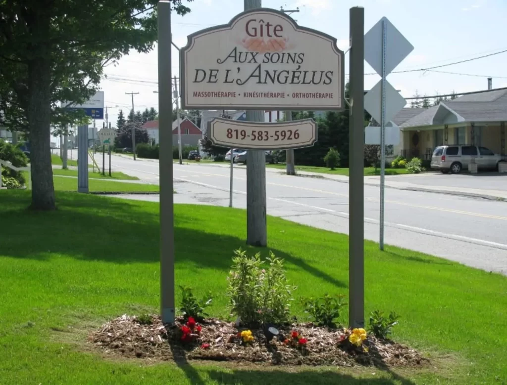 Sign for Aux Soins de l'Angélus B&B in Audet, Quebec, Canada