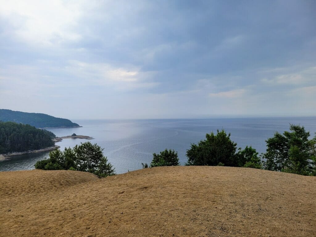 View of Moulin à Baude Bay and the St. Lawrence River from the top of the Dunes de Tadoussac