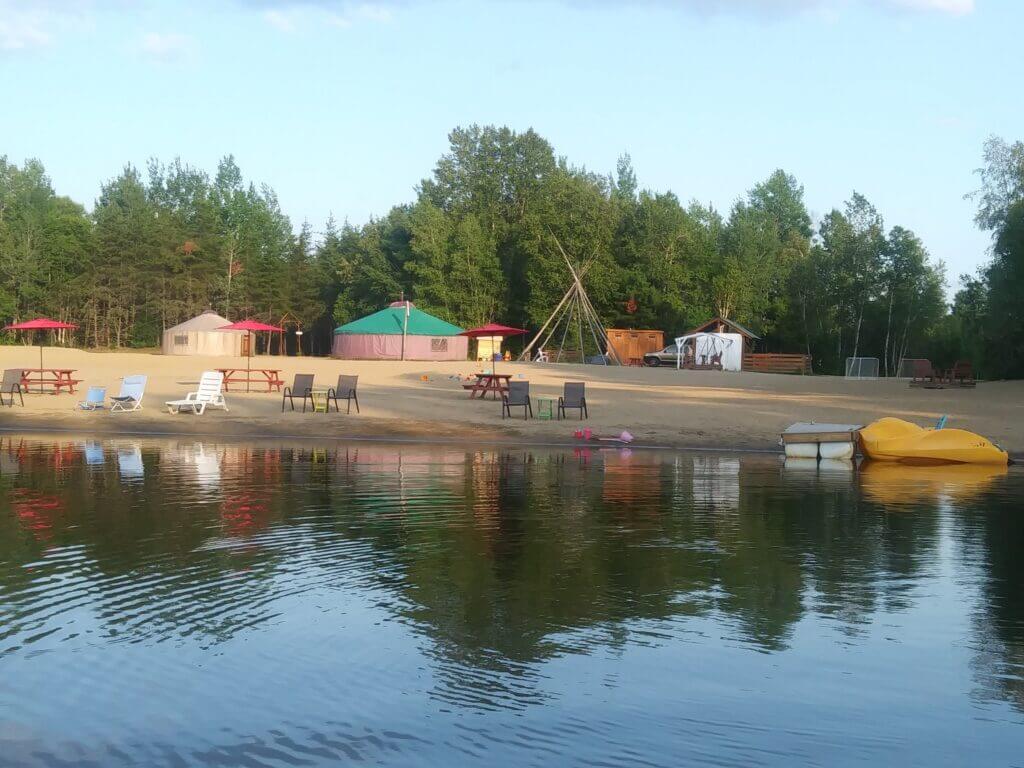 View of Rocanigan Valley site and lake in summer
