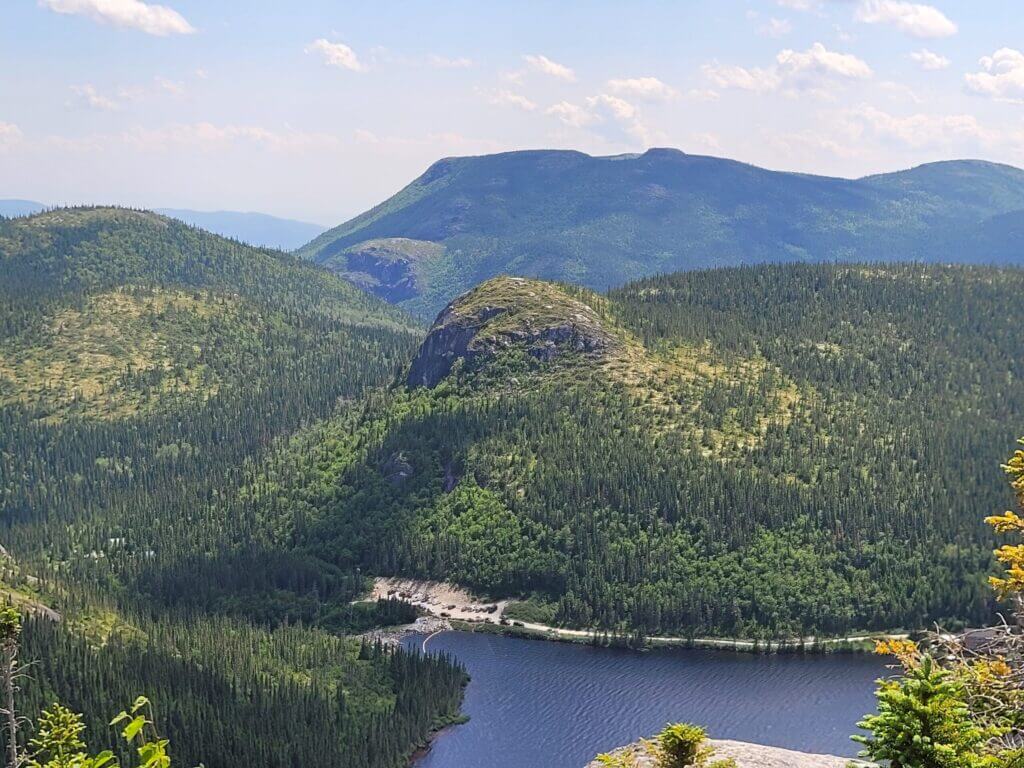 View of the parking area from the top of Pic de l'Aigle on the Sommets trail