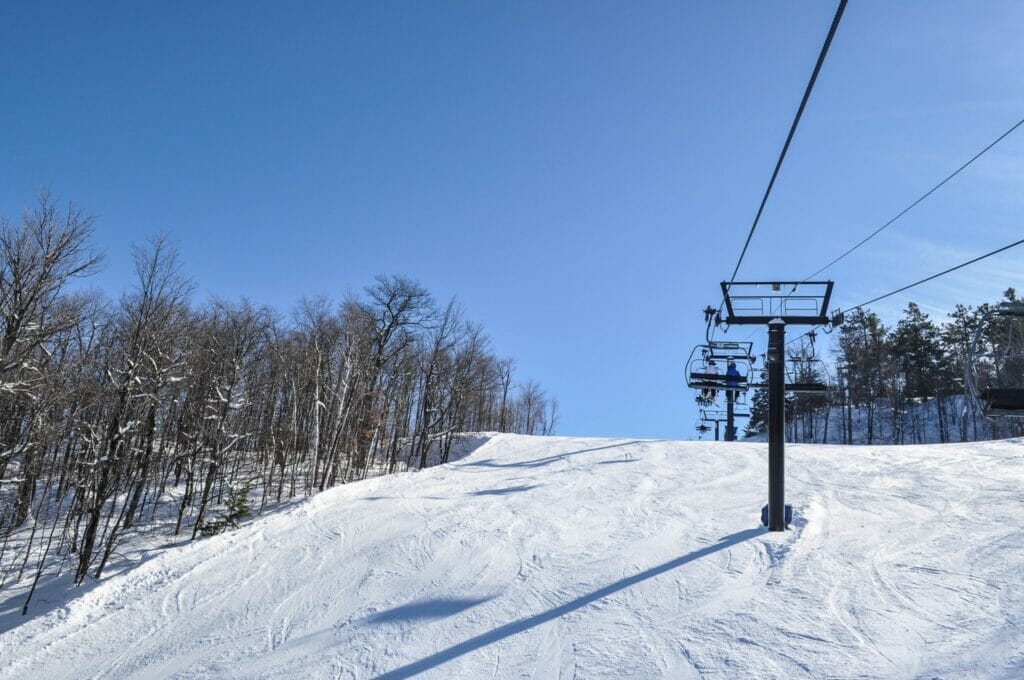 Downhill ski slope and chairlift at Mont Sainte-Marie