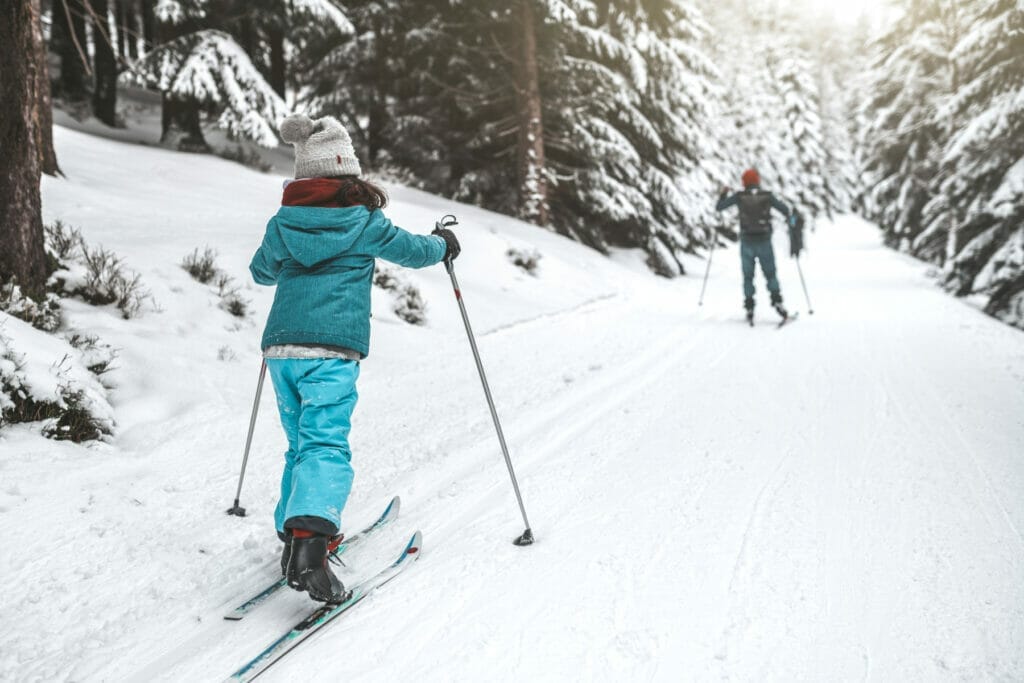 Family cross-country skiing on the Mont Orignal trails