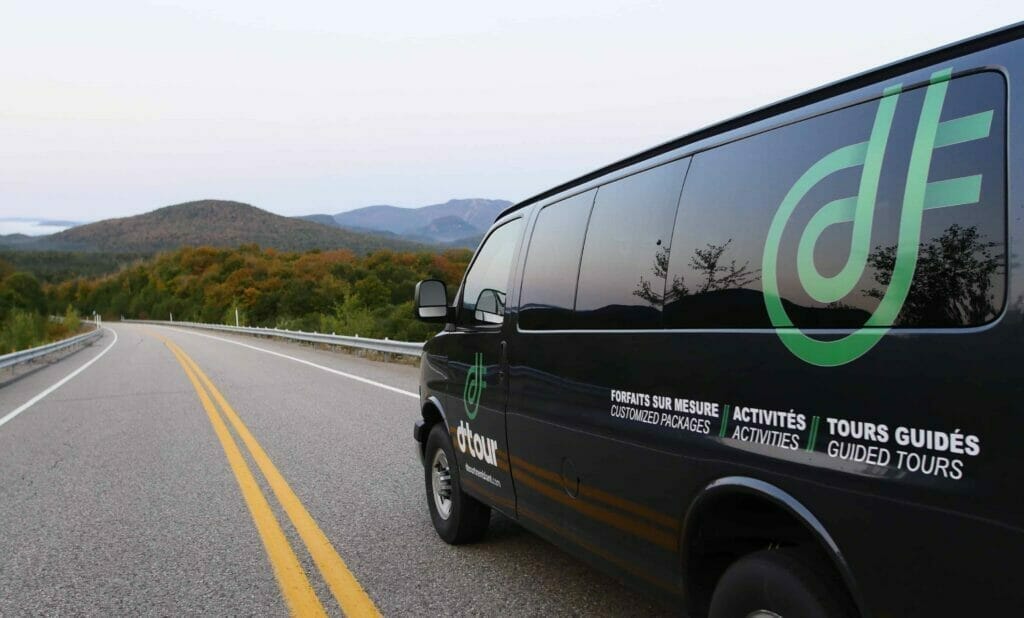 D-Tour vehicle on scenic Mont-Tremblant road