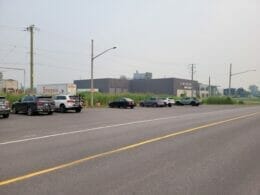 Parking for the Montérégiade bike path in front of Battelec in Iberville